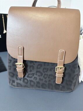 Fashion Backpack w/ slight peel on strap